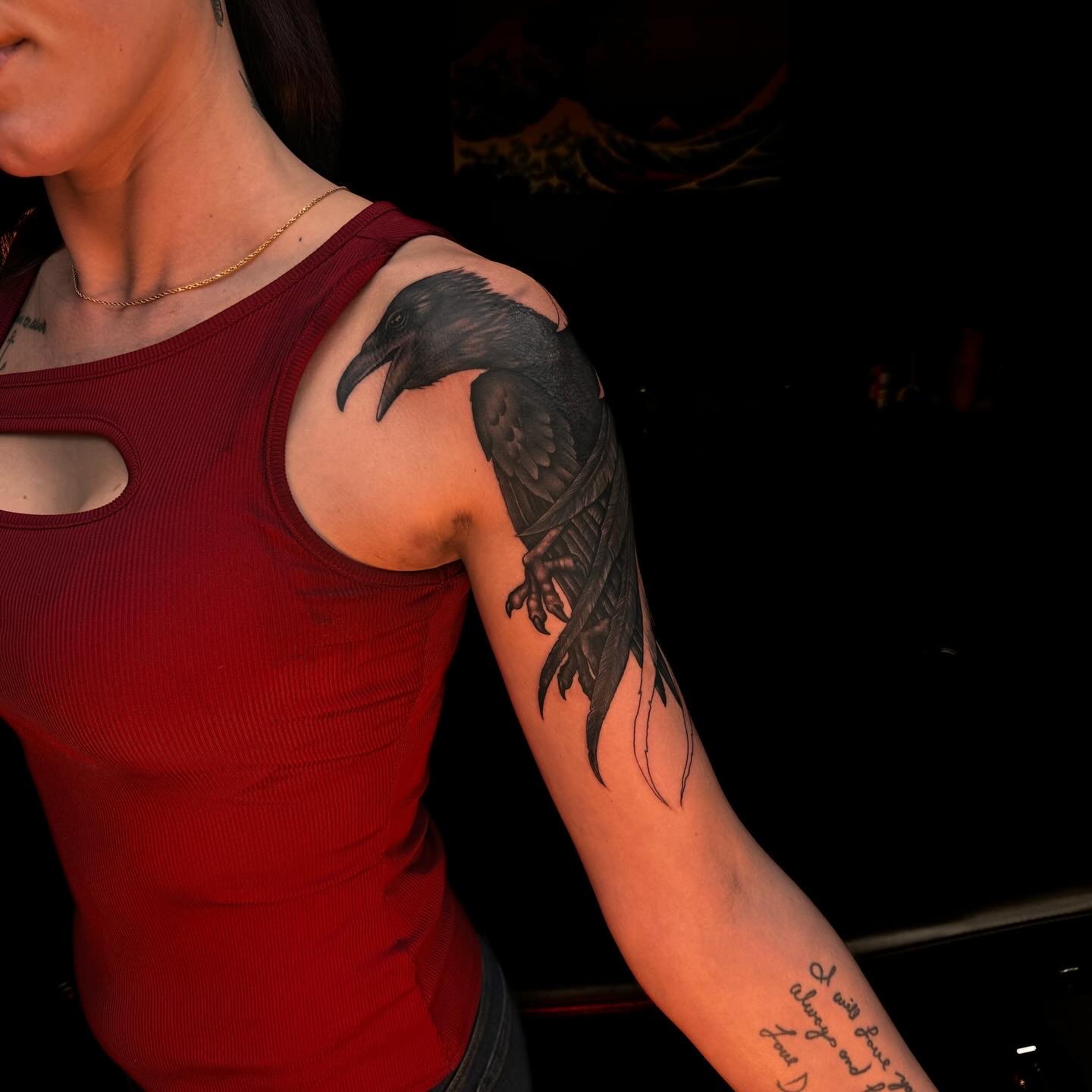 Raven tattoo on shoulder