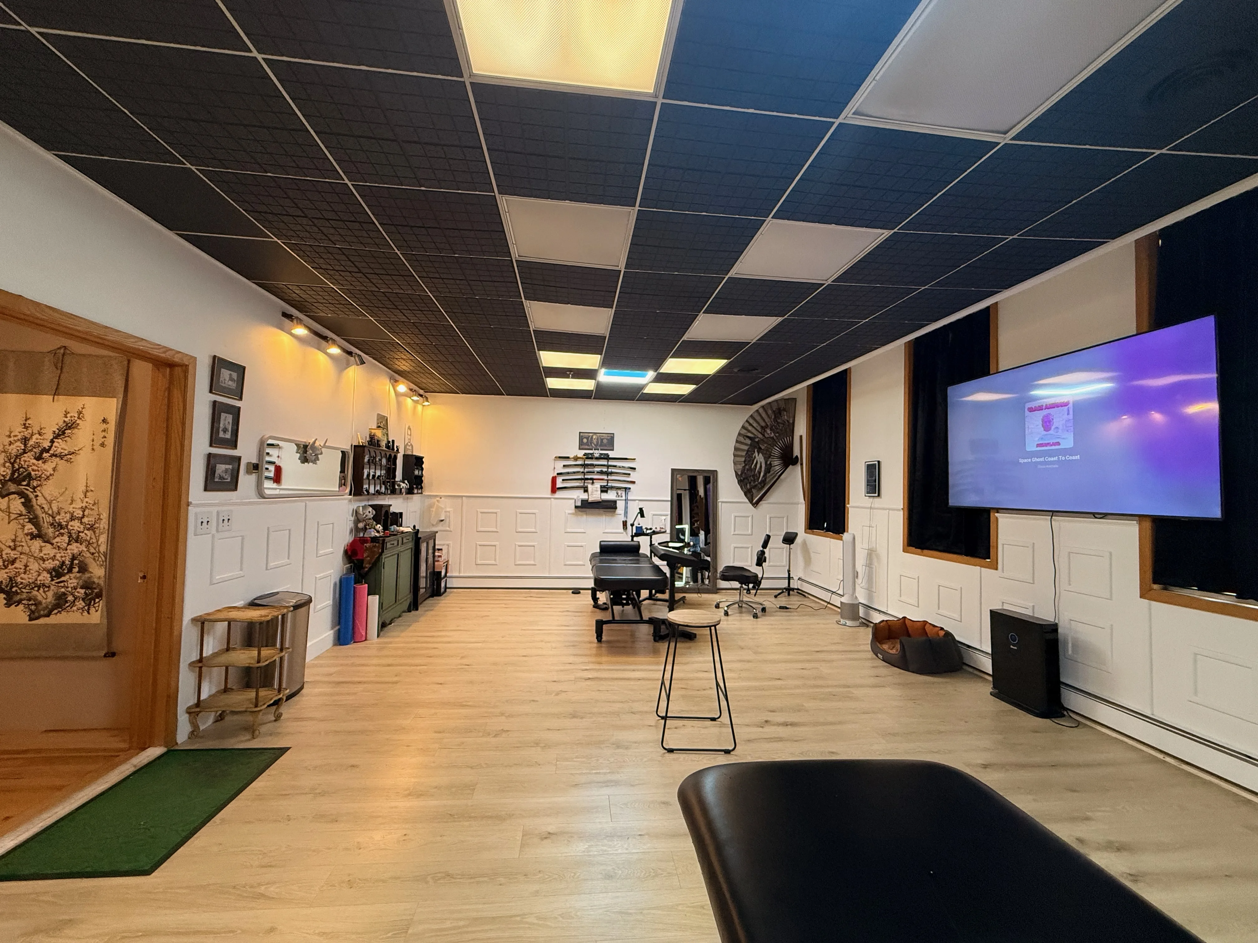 Spacious professional tattoo work area at Illustrated Alex
